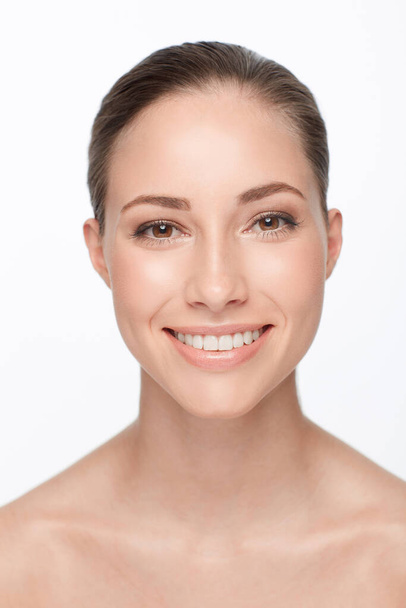 Woman, smile and studio portrait beauty or cosmetic skincare for natural shine, glow or luxury. Female person, nude and health facial or white background clean results, happy or wellness dermatology. - Photo, Image