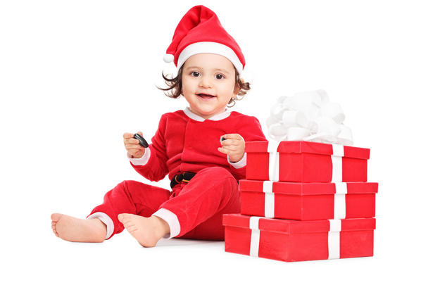 Little girl with Christmas gifts - Φωτογραφία, εικόνα
