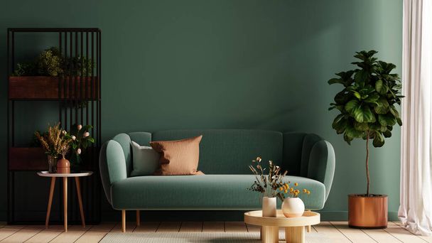 Моделируйте зеленую стену с зеленым диваном и декором в гостиной. - Фото, изображение