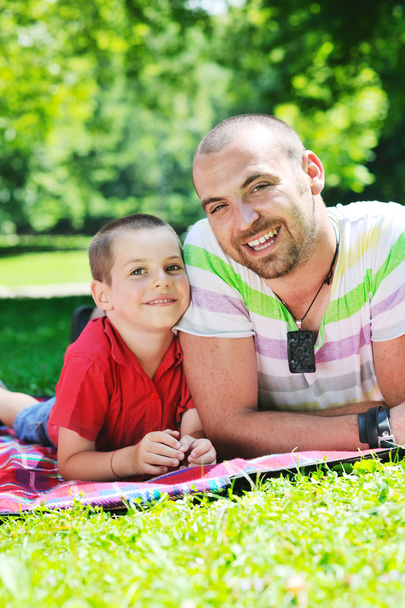 Happy father and son have fun at park - Foto, Bild