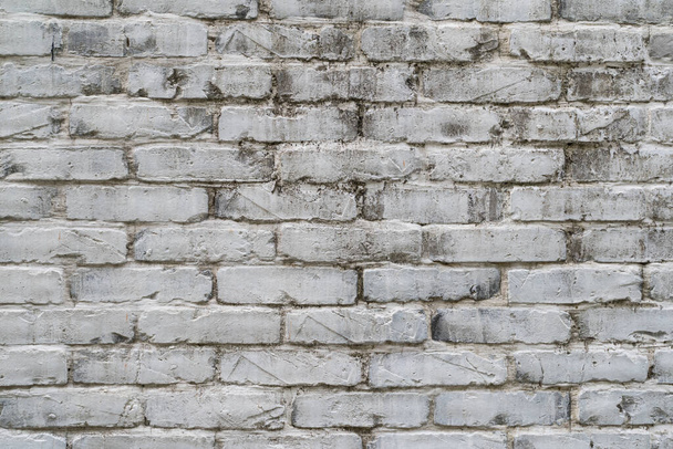 Textur, Ziegel, Wand, es kann als Hintergrund verwendet werden. Ziegelsteinstruktur mit Kratzern und Rissen. Abstrakte alte weiße Ziegelwand strukturierten Hintergrund. - Foto, Bild