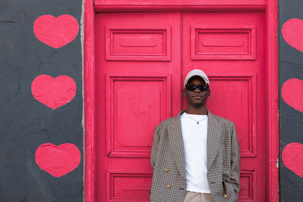 Stylish guy on colorful streets Cape Town - 写真・画像