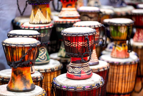 African and Moroccan colorful drums in a store, stacked and in several sizes - Photo, Image