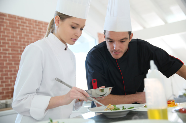 Girl in cooking class with chef - Foto, Bild