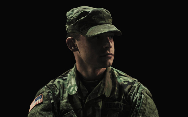 Man, soldier and war on black studio background, ptsd and patriotic in military, sad and depressed. Army, mental health issues and hero for country, service and duty with grief, thinking and veteran. - Photo, Image