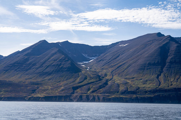 Mountain and water In Icelandic Fjords near Akurery - Photo, Image