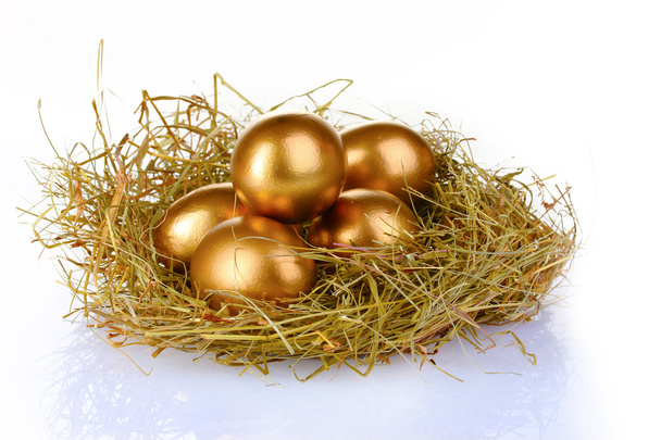 Golden eggs in nest - Foto, Imagem