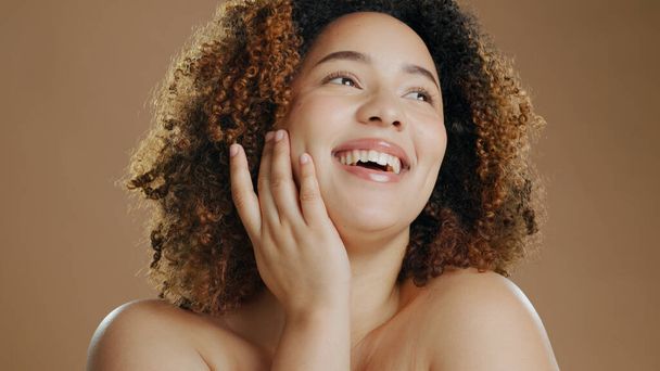 Happy woman, face and skincare in beauty, makeup or cosmetics against a studio background. Female person or model smile for dermatology, soft skin or facial spa treatment and grooming in happiness. - Photo, Image