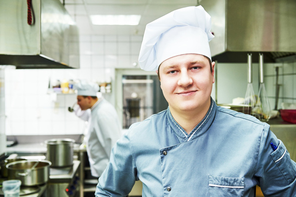 cook chef at restaurant kitchen - Foto, immagini