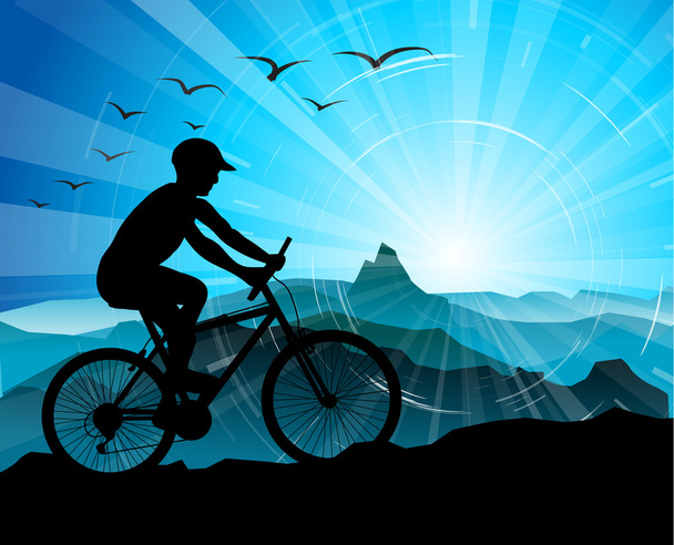 Silueta de ciclista con montañas
 - Vector, Imagen