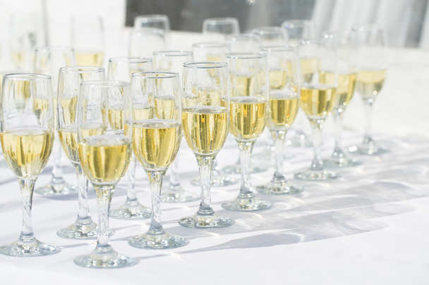 Row of champagne glasses - 写真・画像