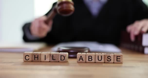 Word of child abuse law and laws with judge gavel. Law and judgment - Footage, Video