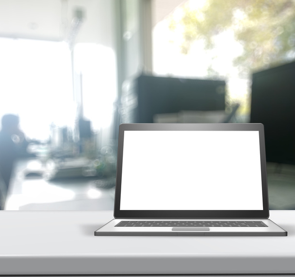 Laptop 3d con schermo bianco su tavolo laminato e schienale sfocato
 - Foto, immagini