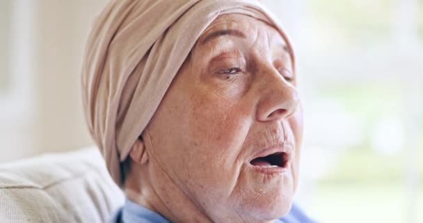 Home, thinking and senior woman with memory, remember and dementia with cancer, sad and retirement. Elderly person, old lady and pensioner with stress, depression and alzheimer with peace and anxiety. - Video, Çekim