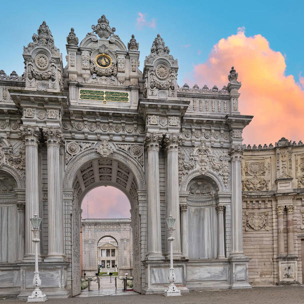 Grand entrance to the 19th century Dolmabahce Palace in Istanbul, Turkey, served as the main residence of the Ottoman sultans for over 60 years. The entrance is decorated with intricate carvings - Photo, Image