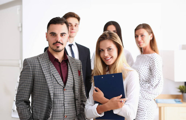 Group of smiling people stand in office looking in camera portrait. White collar power mediation solution project creative advisor participation profession train bank lawyer client visit concept - Photo, Image