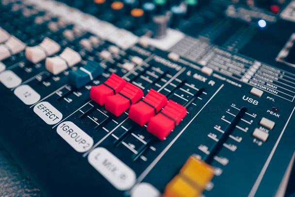 Sound mixer or concert sound engineer, closeup studio motorized volume level control sliders stero split channel device - Photo, Image
