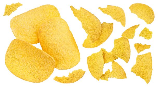 Potato chips isolated on white background with clipping path and full depth of field. Top view. Flat lay - Photo, Image