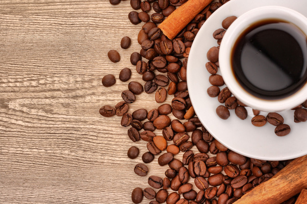 Coffee with cinnamon on wooden texture background - Zdjęcie, obraz