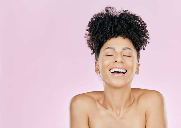 Happy, skincare and woman in studio for body care, self love and dermatology results on pink background. Smile, beauty and female wellness model relax after cosmetic, treatment and pamper routine. - Photo, Image
