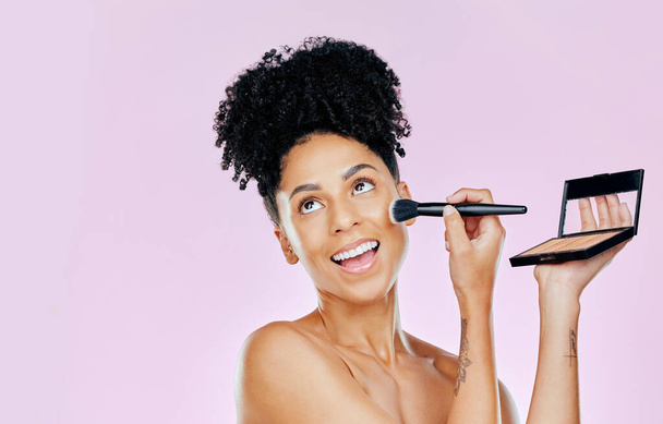 Makeup brush, foundation and studio face of happy woman with tools for skincare shine, powder application or makeover. Beauty face cosmetics, morning routine and spa person smile on pink background. - Foto, Imagem