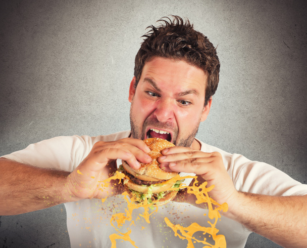 Man eating a sandwich - Photo, Image