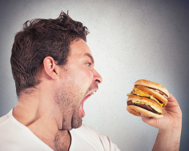 homem comendo um sanduíche - Foto, Imagem