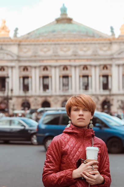blonde woman portrait in front of Opera theater Paris, France. - Foto, afbeelding