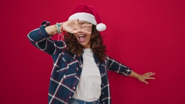 Nuori nainen yllään Santa hattu
 - Materiaali, video