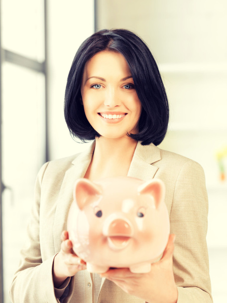 lovely woman with piggy bank - Fotografie, Obrázek