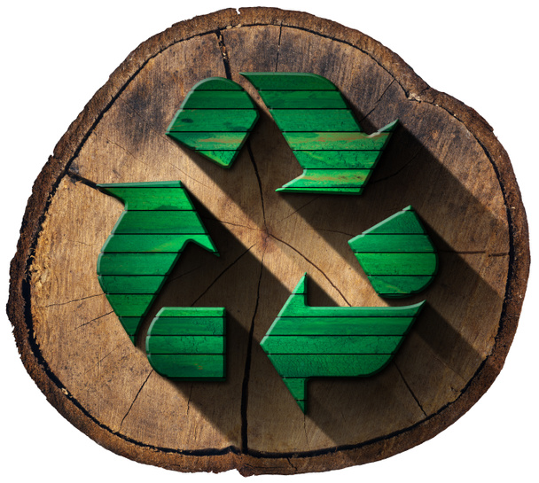 Símbolo de reciclaje en tronco de árbol
 - Foto, imagen
