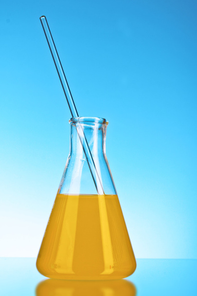 Conical flask on blue background - Photo, image