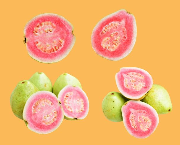 Pink or red Gauva fruit isolated with clipping path in cream background, no shadow, healthy tropical fresh fruit - Photo, Image