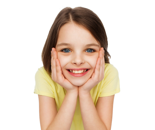 smiling little girl over white background - Zdjęcie, obraz