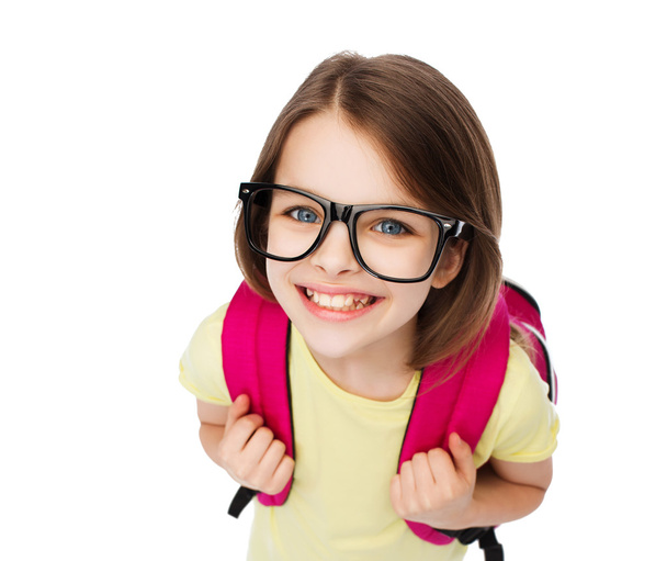 happy smiling teenage girl in eyeglasses with bag - Valokuva, kuva
