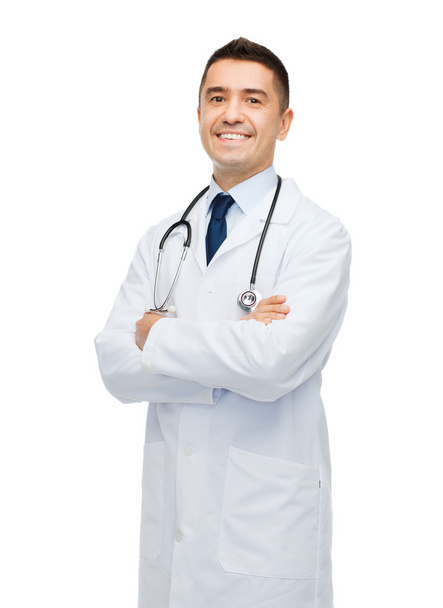 smiling male doctor in white coat - Фото, изображение