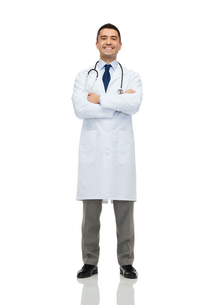 smiling male doctor in white coat - Valokuva, kuva