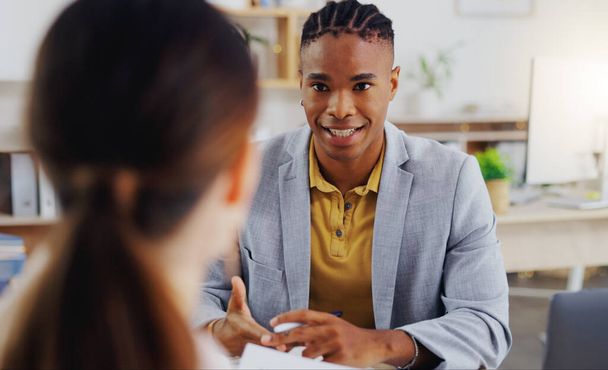Business, professional and black man with a client, planning and discussion in workplace for new project. Male consultant, employee and lady in office, discussion and explain schedule and deadline. - Photo, Image