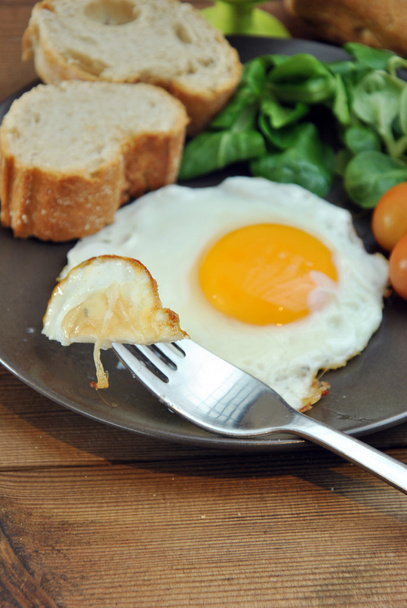 Fried eggs with bread and oil - Photo, Image