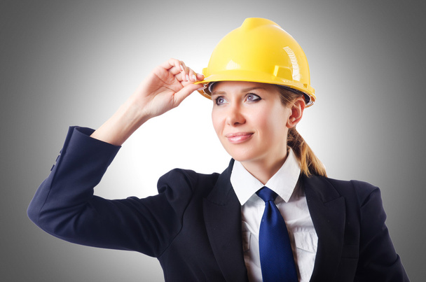 Businesswoman with hard hat - Photo, Image