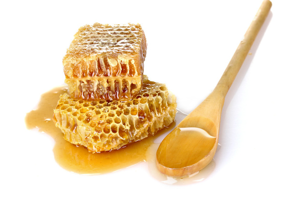 Beautiful combs, spoon and honey - Фото, изображение