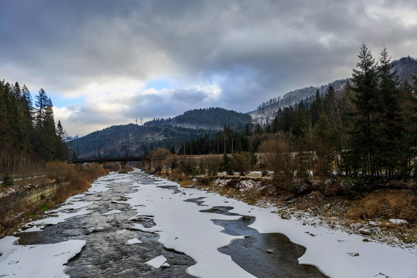 Mountain winter river, mountains and cloudy sky - Photo, Image