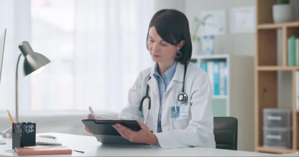 Checklist, paperwork or doctor writing in a notebook for medical notes, feedback review or schedule. Woman, healthcare update info or nurse working on a science document report analysis on clipboard. - Footage, Video