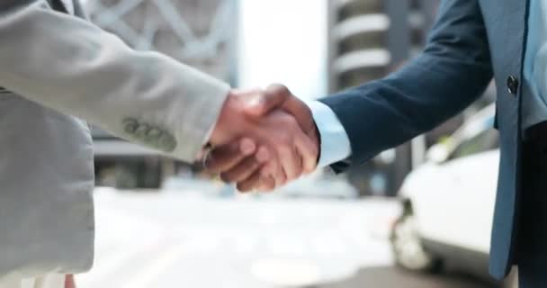 Business people, city and shaking hands for success of deal, b2b partnership or agreement of negotiation. Closeup, team introduction and handshake for networking, support promotion or welcome outdoor. - Footage, Video