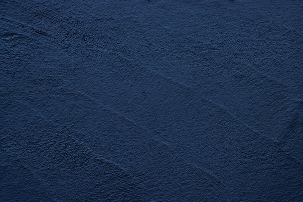 Blauw gekleurde abstracte muur achtergrond met texturen van verschillende tinten blauw - Foto, afbeelding