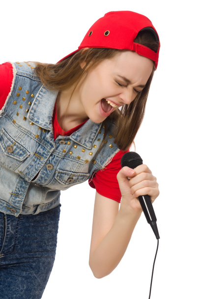 mooi meisje zingt karaoke geïsoleerd op wit - Foto, afbeelding