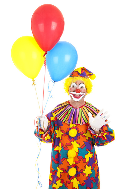 Клоун машет воздушными шарами
 - Фото, изображение
