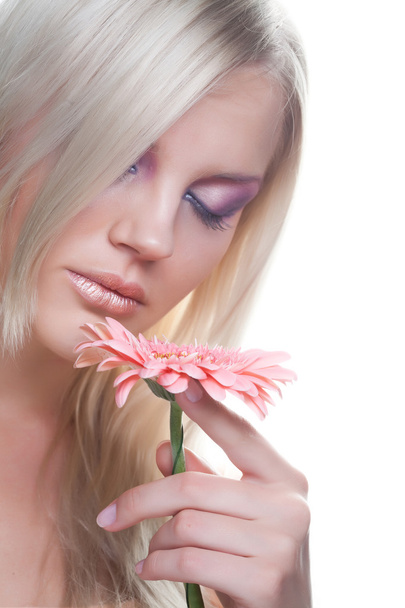 Beautiful young woman with gerber flower - Foto, Imagen