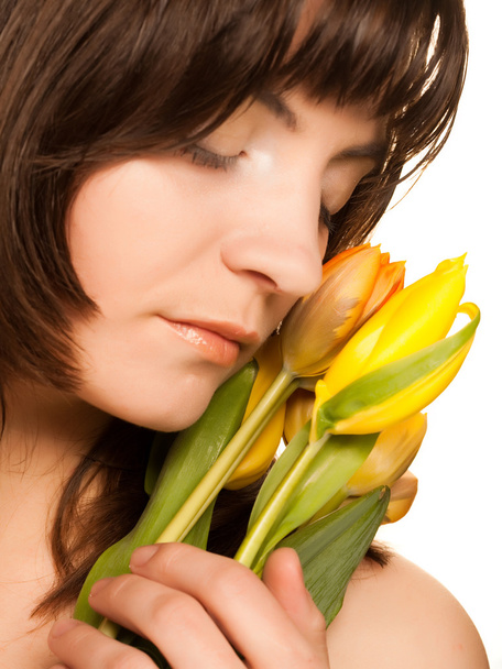 picture of happy woman with yellow tulips  over white - Photo, Image