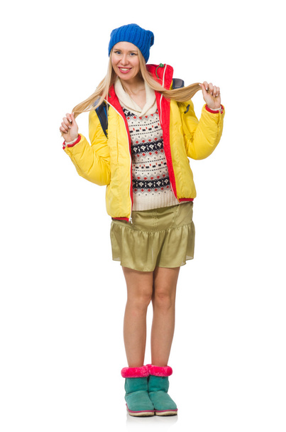 Ένα κορίτσι με λαμπερά χειμωνιάτικα ρούχα απομονωμένο στα λευκά - Φωτογραφία, εικόνα